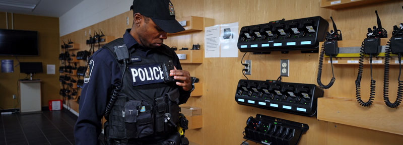 officer preparing bwc on his uniform