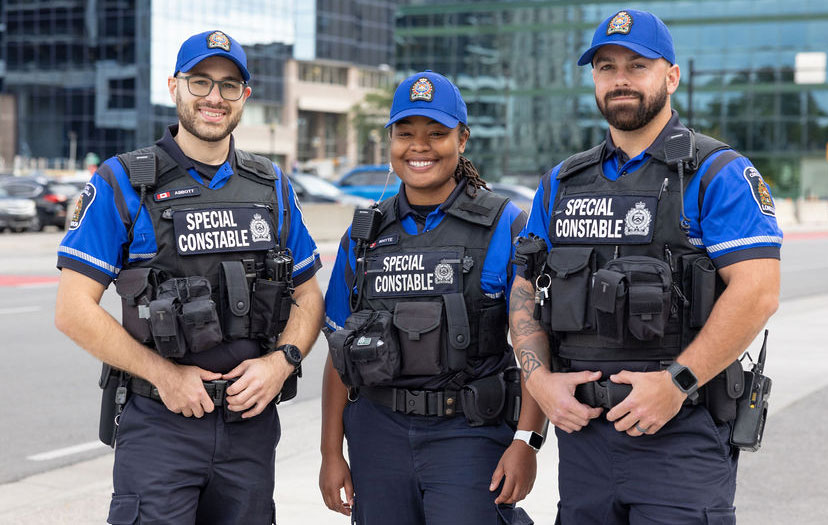 Three Special Constables, standing downtown London